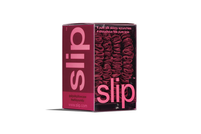 Maroon slip skinny scrunchies in maroon packaging on a white background