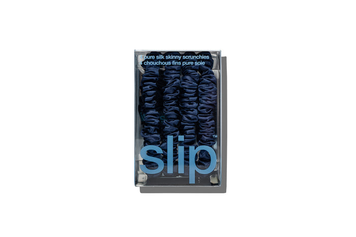 Navy slip packaging with navy scrunchies on a white background
