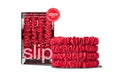 Set of vibrant red skinny scrunchies from the "Back to School" collection with Slip packaging on a white background
