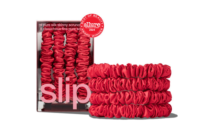 Set of vibrant red skinny scrunchies from the "Back to School" collection with Slip packaging on a white background