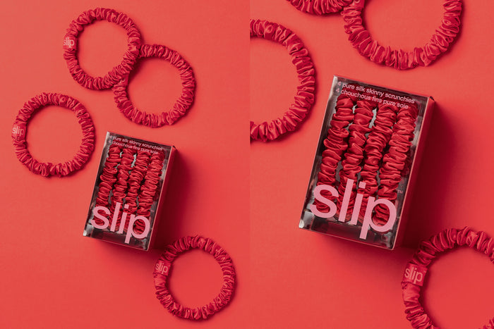 red silk scrunchies and red slip packaging on a red background