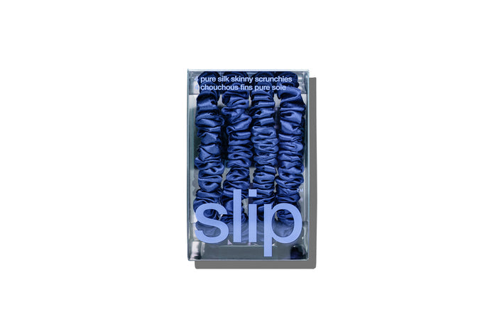 Box of 'slip' skinny scrunchies on a white background