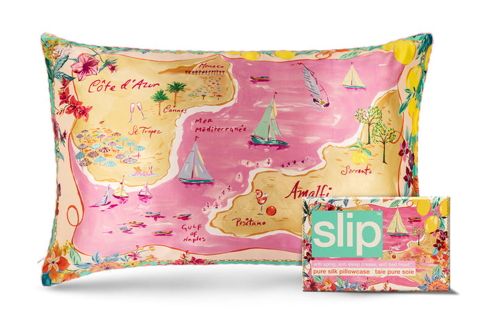 A colorful slip silk pillowcase with a beach map graphic print, with matching packaging on a white background.