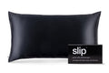 A black slip silk king pillowcase with branded packaging on a white background.