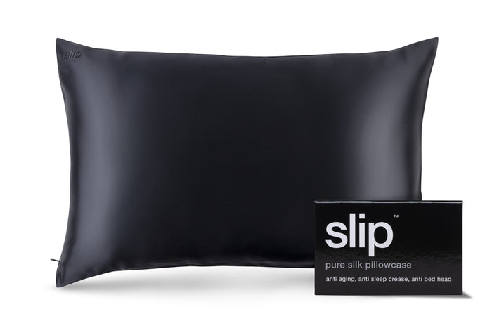 A black slip silk queen pillowcase with branded packaging on a white background.