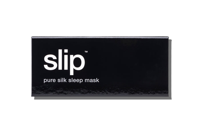 A black slip silk sleep mask branded box on a white background.