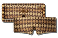 A slip blockout sleep mask with a brown, tan, and beige argyle pattern, shown in front of its matching patterned packaging box on a white background.