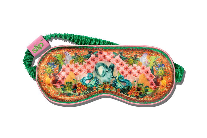 A floral patterned slip silk sleep mask with Capricorn star sign details.
