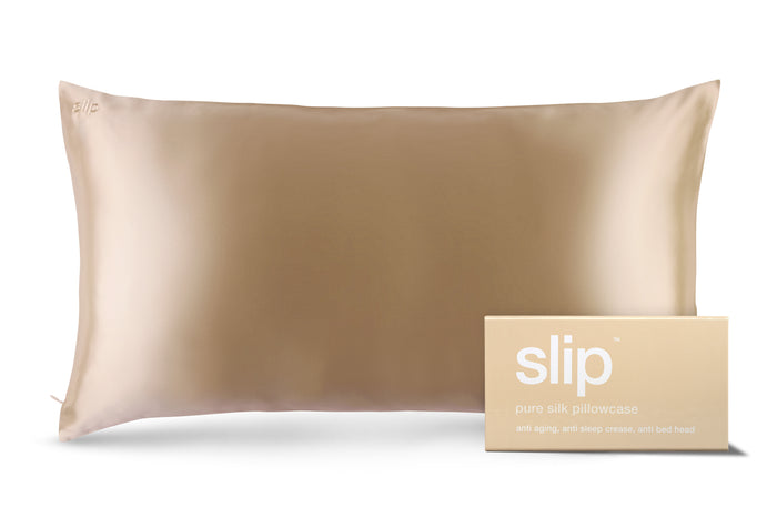 Caramel slip silk king pillowcase with branded packaging on a white background.