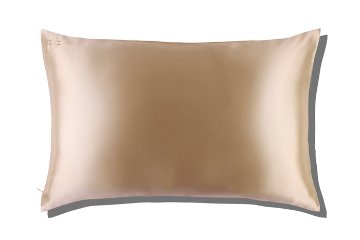 A caramel slip silk queen pillowcase on a white background.