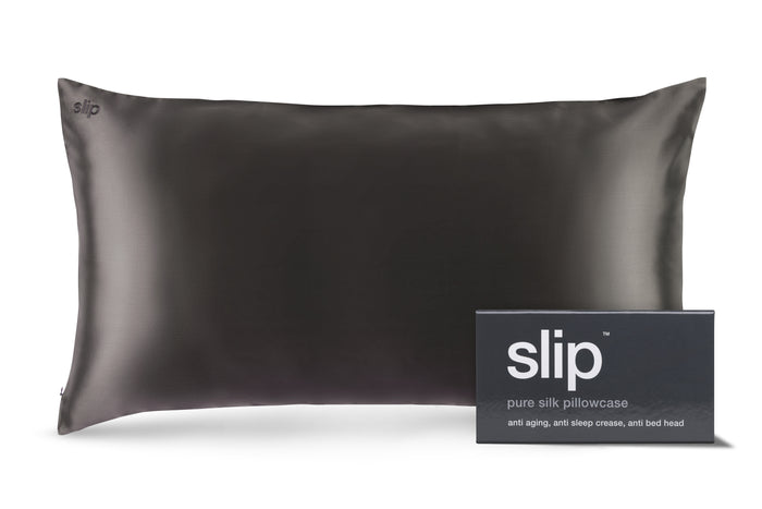 A charcoal slip silk king pillowcase with branded packaging on a white background.