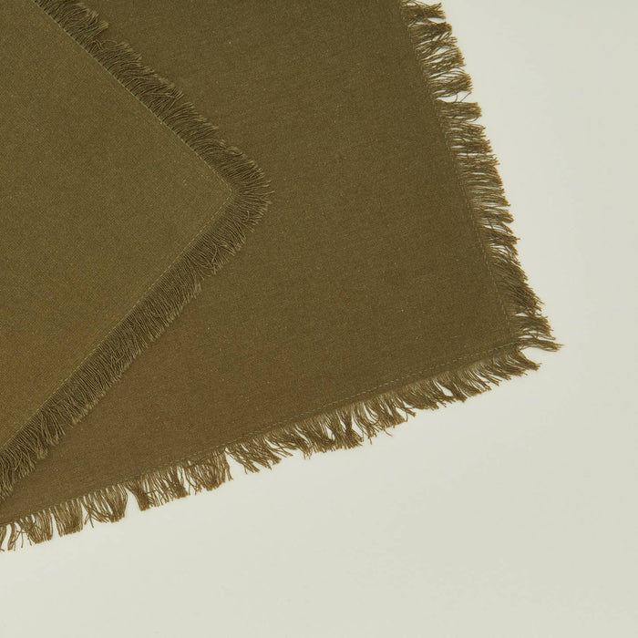Close up view of essential cocktail napkin in olive