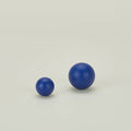Large and small essential sphere knobs in klein blue