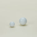 Essential knobs in white in large and small