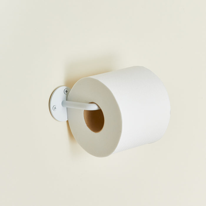Essential toilet paper in white with toilet paper roll