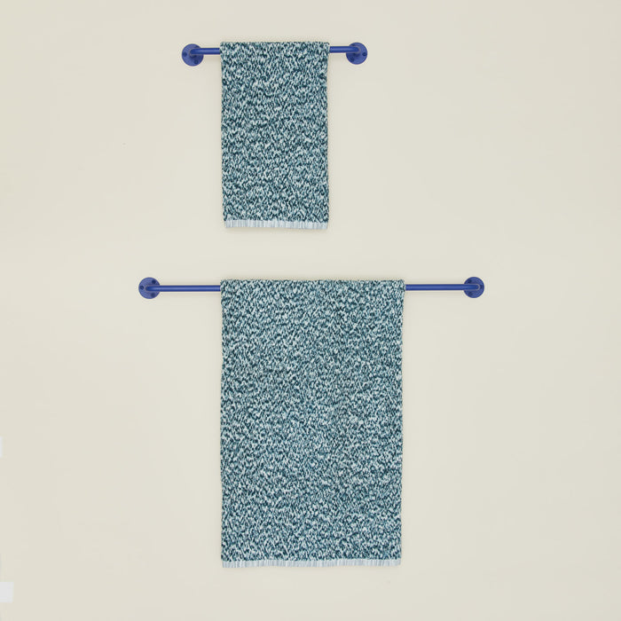 Essential towel bars in klein blue with towels