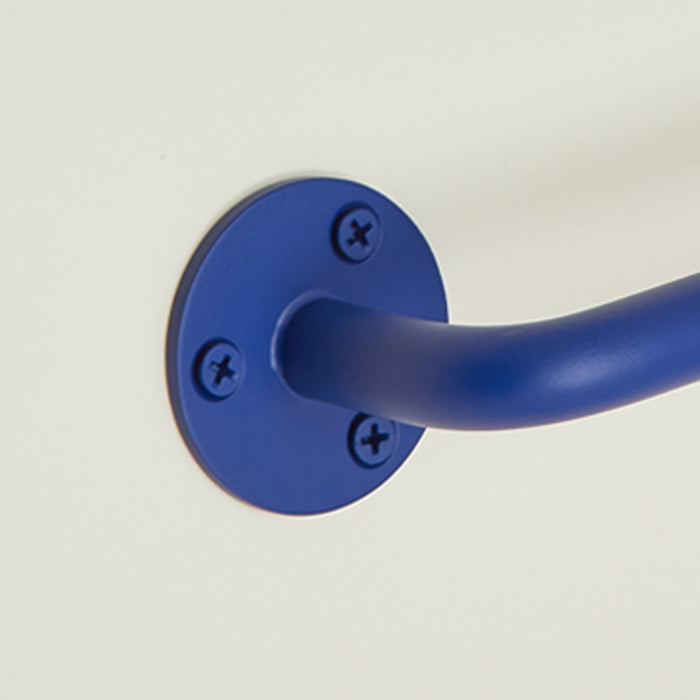 Close up view of essential towel bar in klein blue