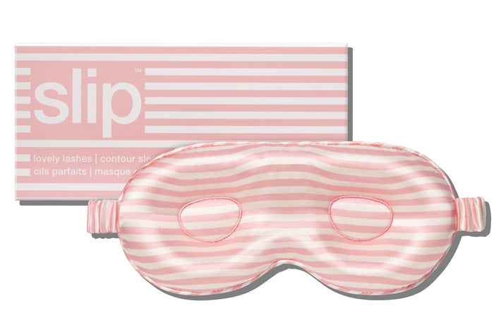 A white and pink stripe slip silk contour sleep mask designed to protect delicate eyelash extensions, with the branded packaging on white background.