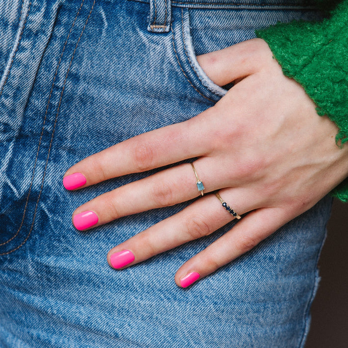 Gaga Pink Maniac Nails bright pink gel stickers on hand with jeans