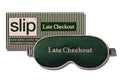 Sleep mask with 'Late Checkout' embroidered text and 'slip' packaging on a white background