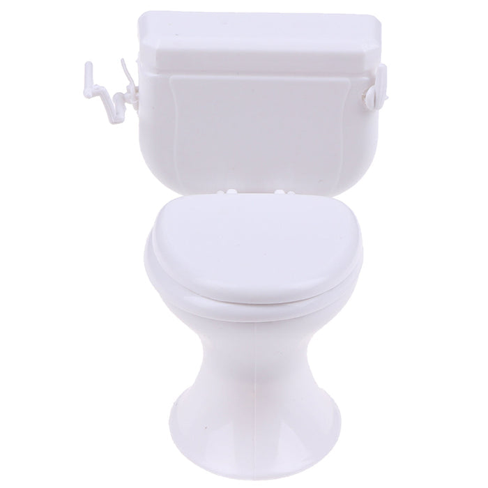 White dollhouse toilet front view