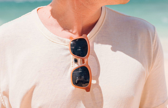 PROD_SUN_MO_RSL sunski moraga rust slate sunglasses on shirt