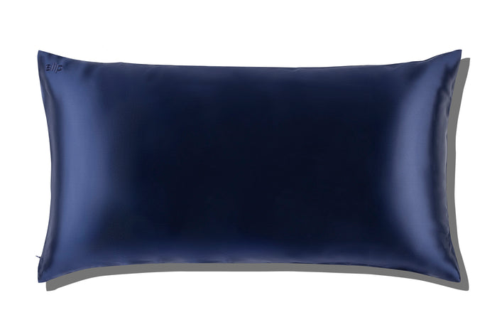 A black slip silk king pillowcase on a white background.