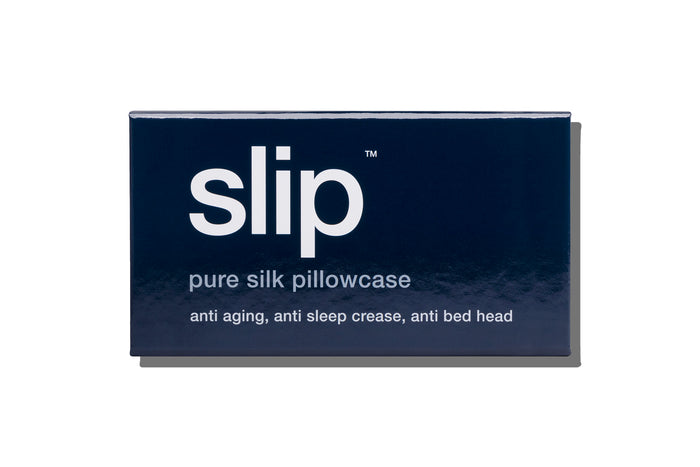 A black slip silk king pillowcase branded packaging on a white background.