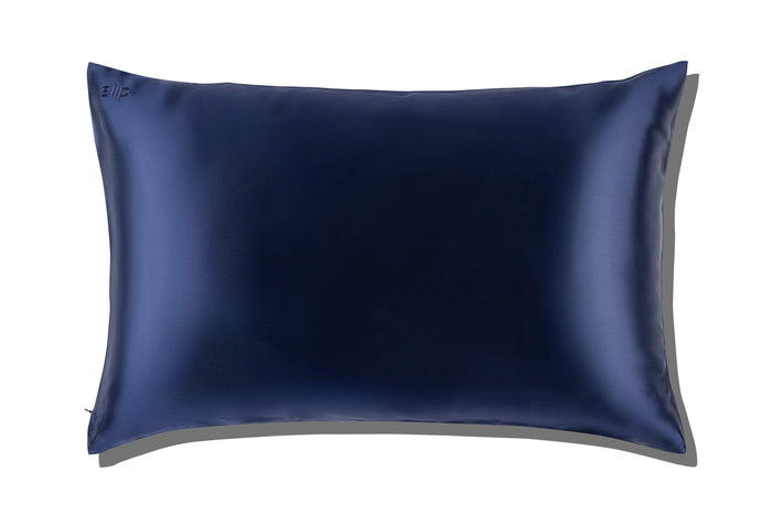 A navy blue slip silk queen pillowcase on a white background.
