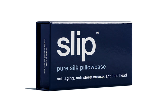 Navy blue slip silk queen pillowcase branded packaging on a white background.