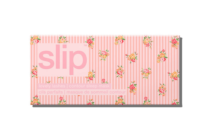A floral pink stripe slip silk contour sleep mask packaging box on white background. Designed to protect delicate eyelash extensions.