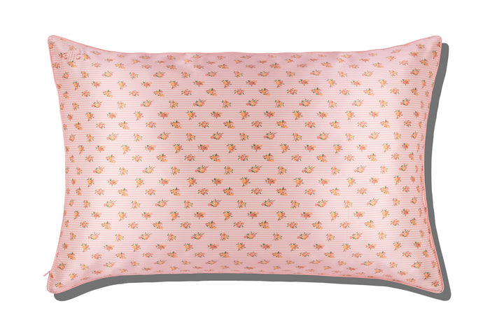 A floral pink and white stripe pattern slip silk queen pillowcase on a white background.