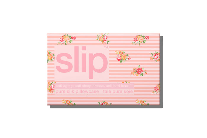 A floral pink and white stripe pattern slip silk queen pillowcase branded packaging on a white background.