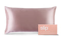 A pink slip silk king pillowcase with branded packaging on a white background.