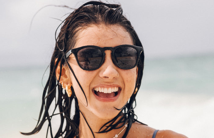 PROD_SUN_PO_BSL sunski portola black slate girl laughing