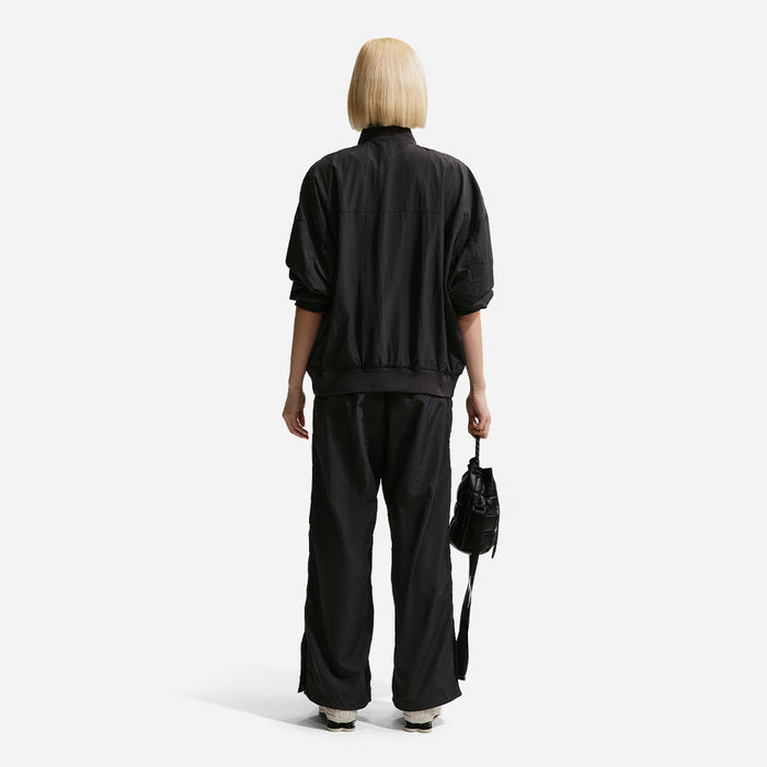 Quần Dài Thể Thao Nữ Nike Sportswear Loose High-Waisted Parachute - Đen - Supersports Vietnam