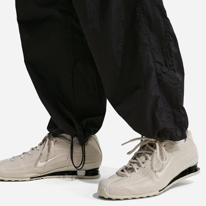 Quần Dài Thể Thao Nữ Nike Sportswear Loose High-Waisted Parachute - Đen - Supersports Vietnam