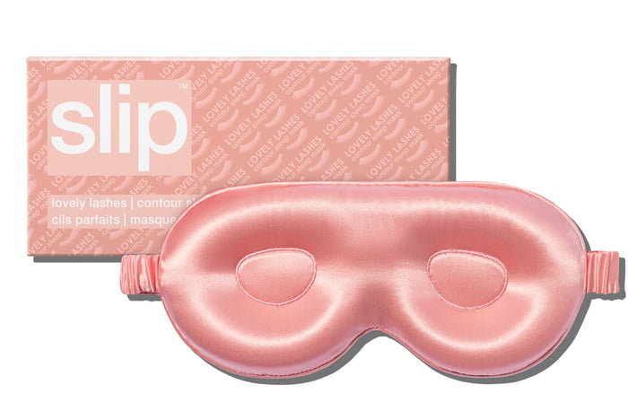 A rose slip silk contour sleep mask designed to protect delicate eyelash extensions, with the brand name 'slip' visible on the packaging.
