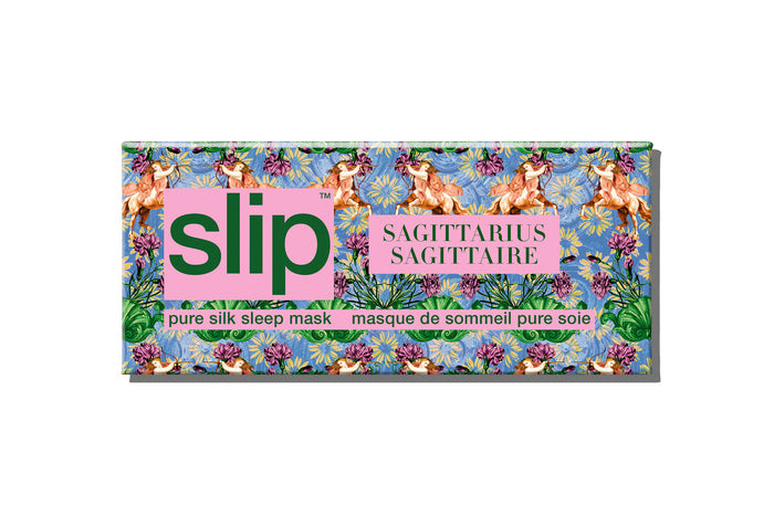 A slip silk sleep mask with a floral and horse pattern packaging box on a white background.