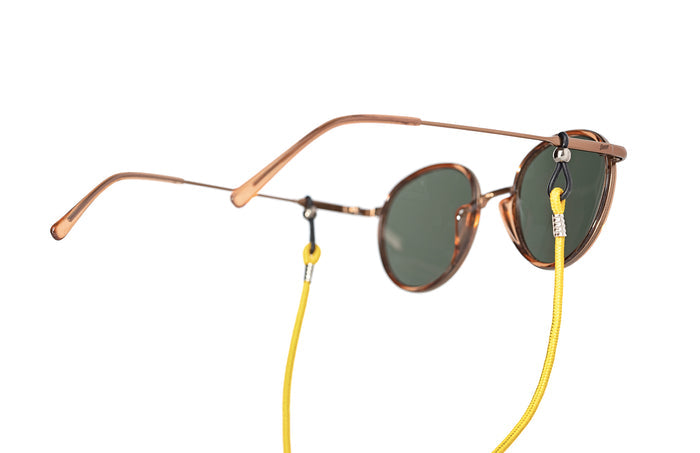 PROD_ACC_SRD_YE sunski sunglasses retainer yellow on a pair of premium sunglasses