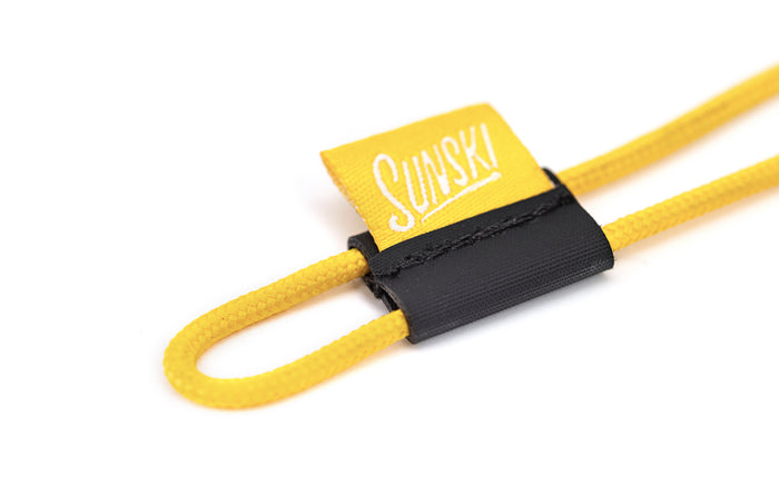 PROD_ACC_SRD_YE sunski sunglasses retainer yellow close up of 8-loop attachment