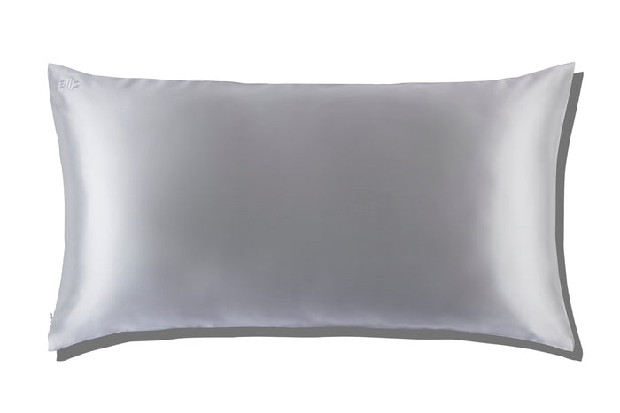 A silver slip silk king pillowcase on a white background.