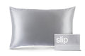 A silver slip silk queen pillowcase with branded packaging on a white background.