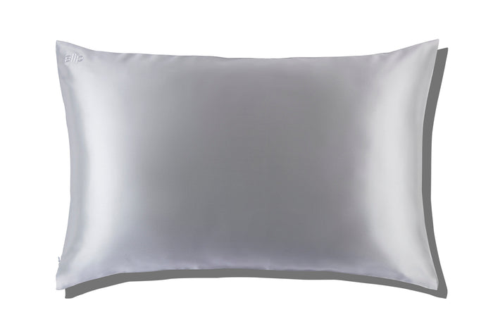 A white slip silk queen pillowcase on a white background.