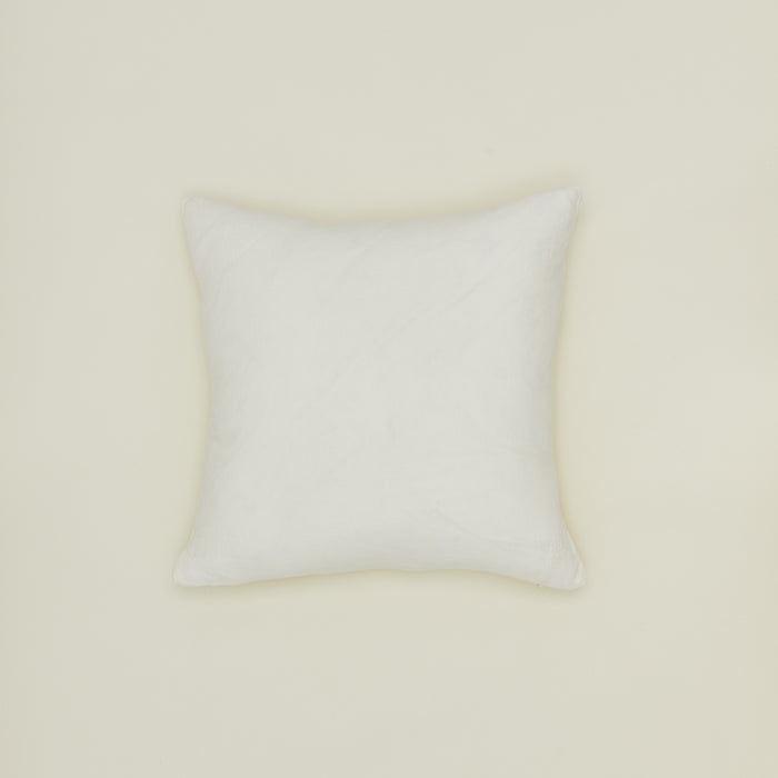 Simple linen pillow in ivory