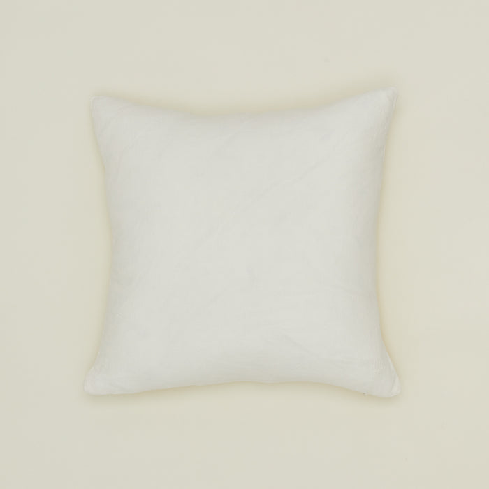 Simple linen pillow in ivory