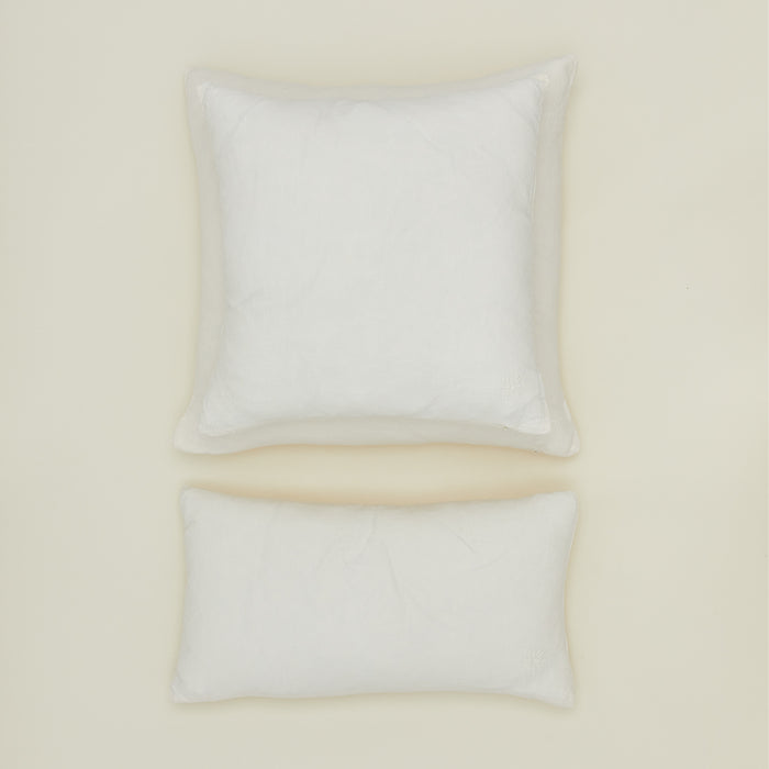 Simple linen pillow in ivory