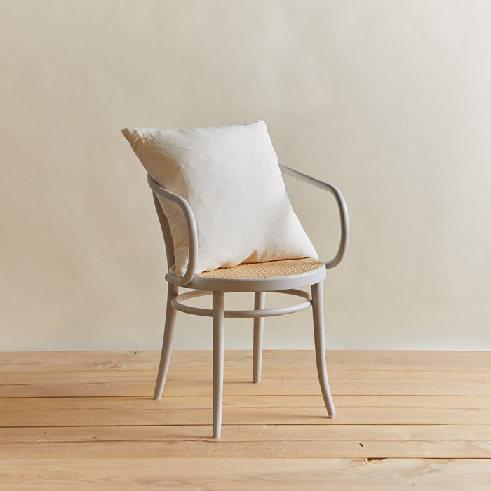Simple linen pillow in ivory