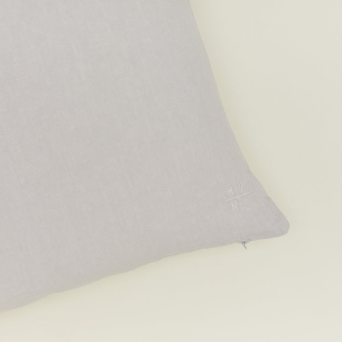 Simple linen pillow in light grey