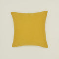 Simple linen pillow in mustard